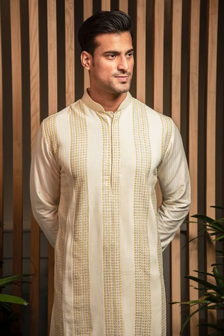 Darshika Menswear Ivory Cotton, Silk Embroidery Linear Pattern Kurta Set Online at Aza Fashions Darshika Menswear_Ivory Cotton, Silk Embroidery Linear Pattern Kurta Set _Online_at_Aza_Fashions