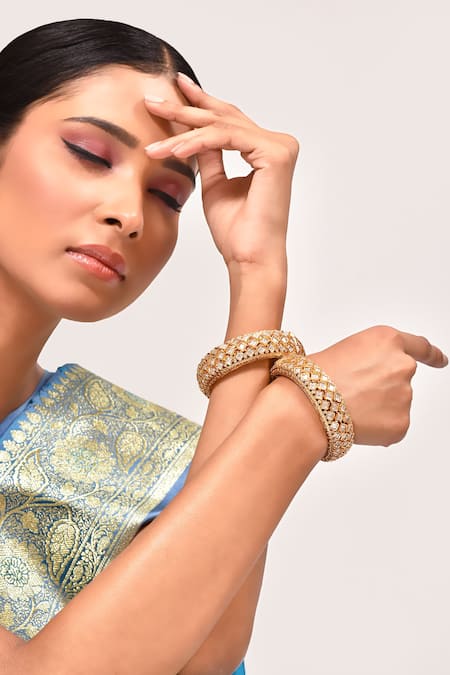 Buy_Zevar By Geeta_Gold Plated Imitation Diamonds Quatrefoil Cut Work Kada - Set Of 2 