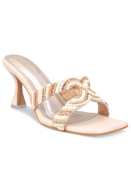 Kaltheos Cream Embellished Pearls And Bead Hourglass Heels at Aza Fashions Kaltheos_Cream Embellished Pearls And Bead Hourglass Heels_at_Aza_Fashions
