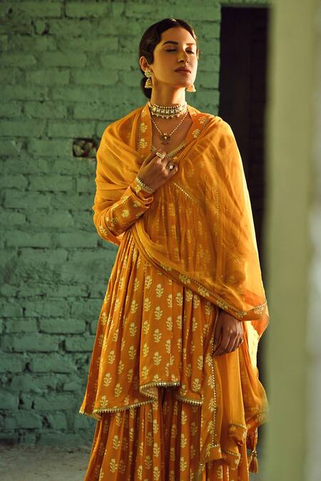 Karaj Jaipur_Yellow Muslin, Chiffon Lace, Tassels, Flower Print Flared Kurta Sharara Set_at_Aza_Fashions