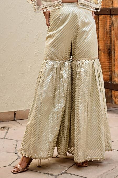 Buy Palak & Mehak Green Net Pearls Round Neck Freya Stripe Pattern Sharara Set With Cape Buy_Palak & Mehak_Green Net Pearls Round Neck Freya Stripe Pattern Sharara Set With Cape
