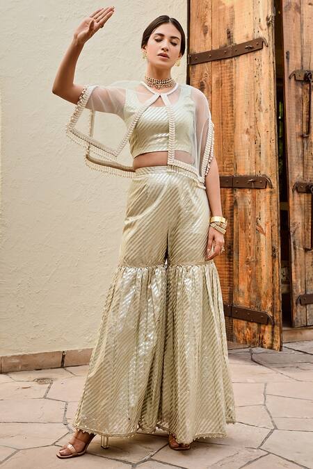 Shop Palak & Mehak Green Net Pearls Round Neck Freya Stripe Pattern Sharara Set With Cape Online at Aza Fashions Shop_Palak & Mehak_Green Net Pearls Round Neck Freya Stripe Pattern Sharara Set With Cape _Online_at_Aza_Fashions