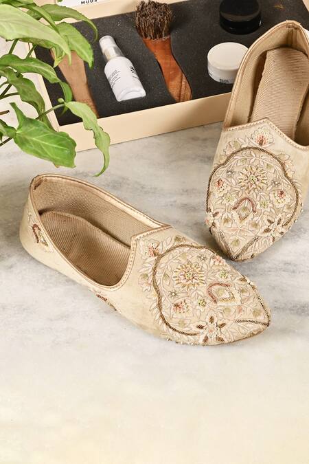 Soniya G_Cream Pu, Silk Cloth Floral Embroidered Pointed Toe Juttis_Online_at_Aza_Fashions