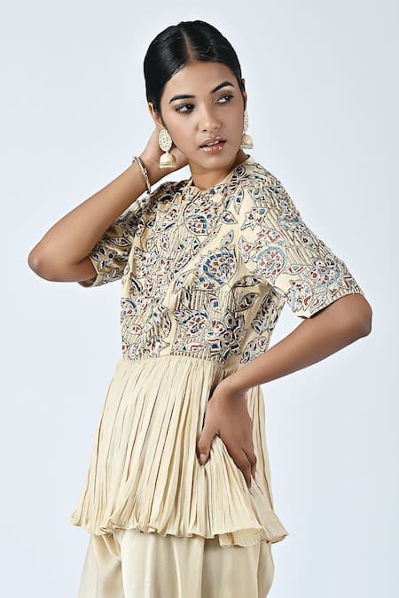 Sejal Kamdar_Beige Satin Cut Work, Embroidery Round Neck Yoke Peplum Jumpsuit _Online_at_Aza_Fashions