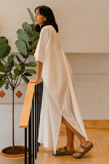 Vanaras_Off White Cotton V-neck Lyla Flared Kaftan Gown_at_Aza_Fashions
