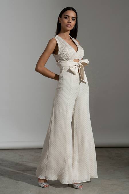 Amrta By Guneet Kondal_Ivory Viscose, Georgette Embroidery Tuscany Date Front Bow Tie Up Jumpsuit _Online_at_Aza_Fashions