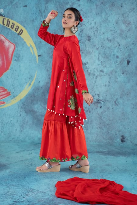 Kacha Tanka Red Cotton Satin Applique Floral Round Neck Asymmetric Kurta Sharara Set at Aza Fashions Kacha Tanka_Red Cotton Satin Applique Floral Round Neck Asymmetric Kurta Sharara Set _at_Aza_Fashions