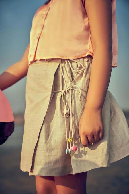 Buy_Little Luxury_Beige Linen Plain Side Tie Skorts  _Online_at_Aza_Fashions