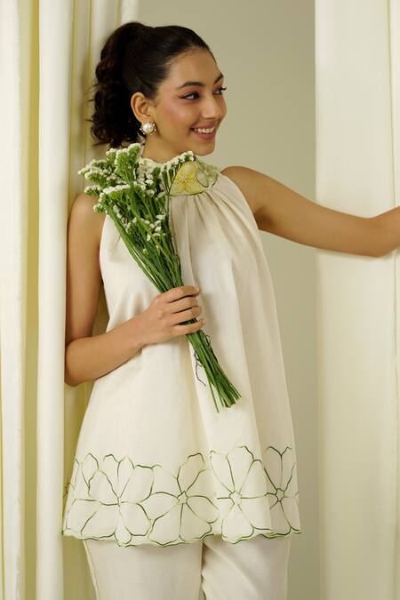 Sakshi Khetterpal Ivory Chanderi Pearls, Beads, Embroidery Halter Neck Top And Pant Set at Aza Fashions Sakshi Khetterpal_Ivory Chanderi Pearls, Beads, Embroidery Halter Neck Top And Pant Set _at_Aza_Fashions