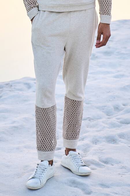 Dash And Dot_White Cotton Mesh Cuff Joggers_Online_at_Aza_Fashions