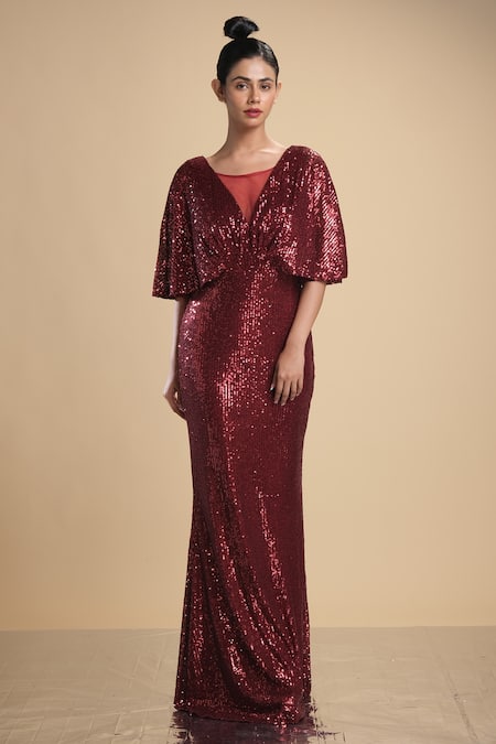 Kommal Sood_Maroon Lycra Stretch Net Embroidered Sequins Cape Sleeve Gown  _Online_at_Aza_Fashions