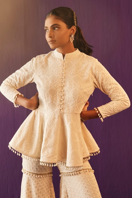 Evra By Nikita_Ivory Georgette Embroidery, Tassels Mandarin Thread Peplum And Gharara Pant Set _Online_at_Aza_Fashions