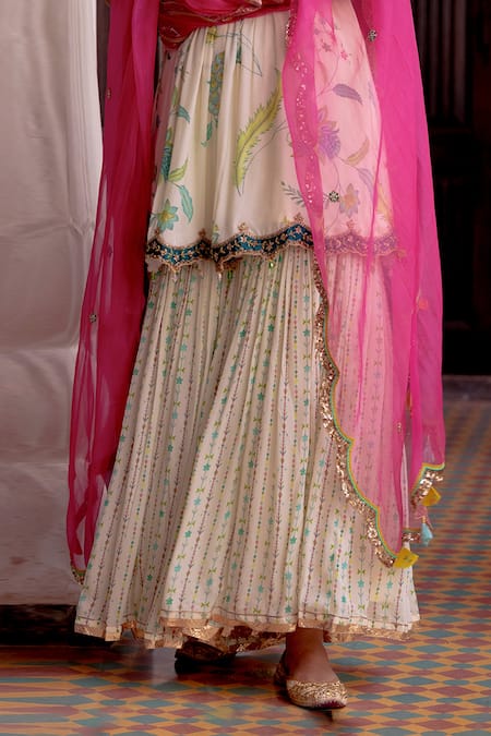 Rajiramniq Ivory Organza, Crepe Floral, Sequins V Neck Fariba Flower Print Gharara Set Online at Aza Fashions Rajiramniq_Ivory Organza, Crepe Floral, Sequins V Neck Fariba Flower Print Gharara Set _Online_at_Aza_Fashions