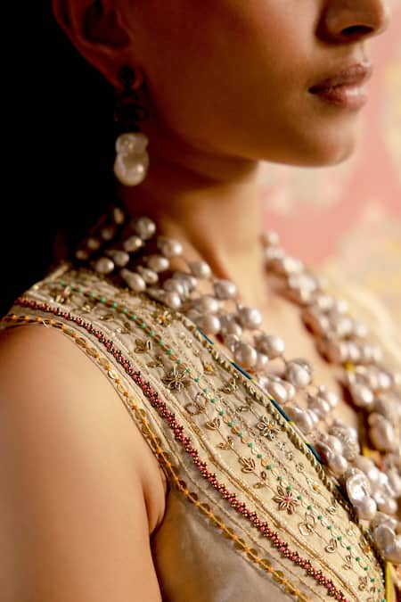 Buy_Rajiramniq_Gold Tissue Embellished Sequins Embroidered Saree With Unstitched Blouse Piece _Online_at_Aza_Fashions