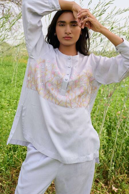 Ayaka Blue Cotton Embroidery Round Neck Straight Floral Top at Aza Fashions Ayaka_Blue Cotton Embroidery Round Neck Straight Floral Top _at_Aza_Fashions