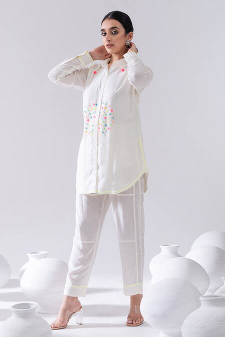 Buy Kacha Tanka Ivory Cotton Pom-poms Collared Thread Embroidered Short Kurta And Pant Set Online at Aza Fashions Buy_Kacha Tanka_Ivory Cotton Pom-poms Collared Thread Embroidered Short Kurta And Pant Set _Online_at_Aza_Fashions