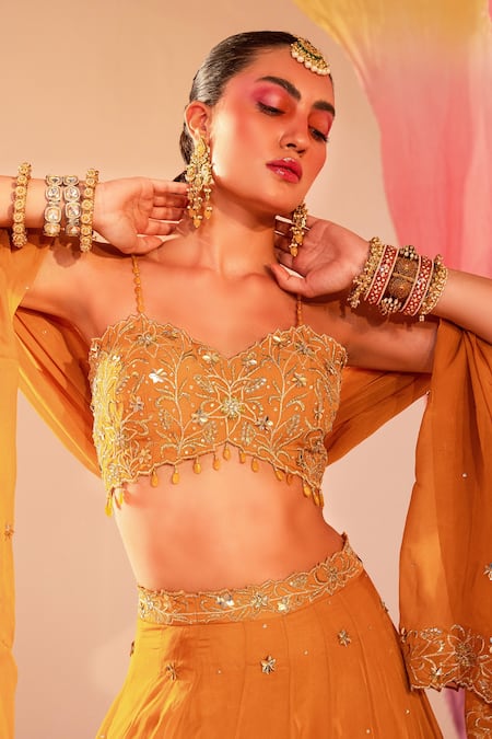 Silky Bindra_Yellow Georgette, Organza, Silk Sequins, Floral Butti Embroidered Lehenga Set _at_Aza_Fashions