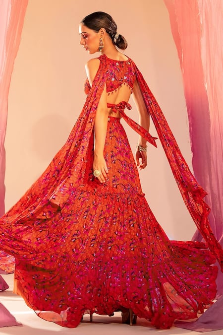 Silky Bindra_Orange Georgette, Silk Sequins, Crystals, Floral Bloom Print Tiered Lehenga Set _at_Aza_Fashions