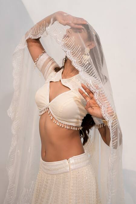 Nayna Kapoor_Ivory Georgette Embellished Cutdana Cut-out Flower Sequin Bridal Lehenga Set _Online_at_Aza_Fashions