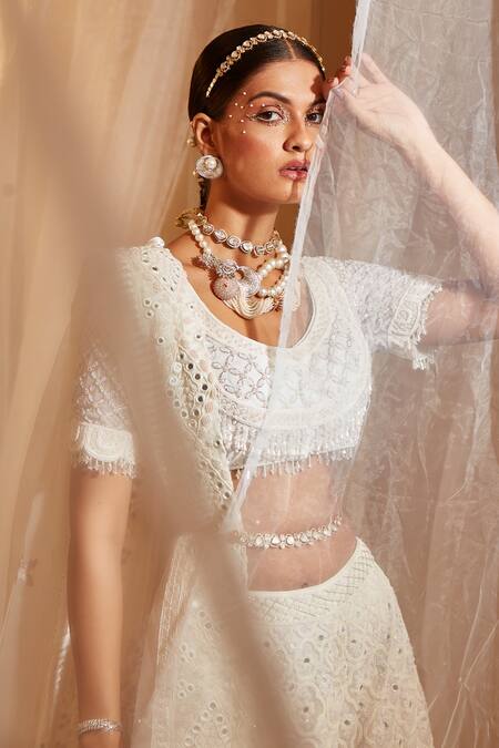 Buy House of Exotique Ivory Net Embroidery Round Neck Geometric Embellished Lehenga Set Online at Aza Fashions Buy_House of Exotique_Ivory Net Embroidery Round Neck Geometric Embellished Lehenga Set _Online_at_Aza_Fashions