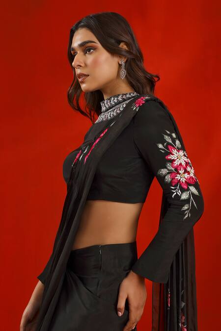 ISHA GUPTA TAYAL Black Chiffon, Crepe Pre-stitched Magnolia Print Saree With Embroidered Blouse Online at Aza Fashions ISHA GUPTA TAYAL_Black Chiffon, Crepe Pre-stitched Magnolia Print Saree With Embroidered Blouse _Online_at_Aza_Fashions
