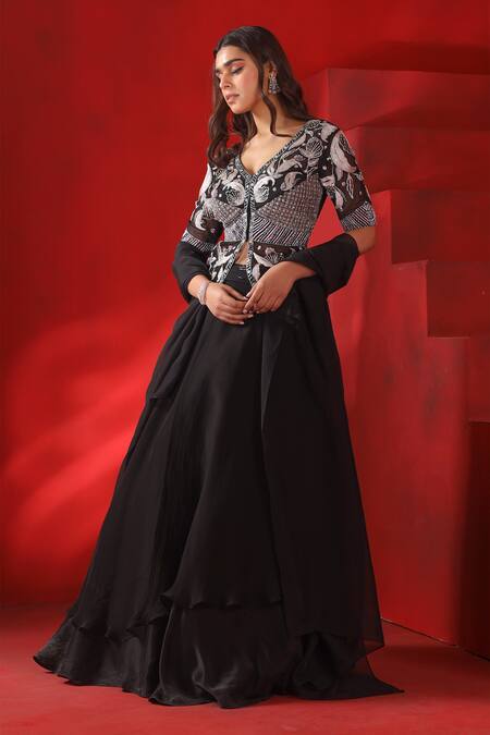 ISHA GUPTA TAYAL Black Crepe Zari V-neck Layered Lehenga With Embroidered Jacket Blouse Online at Aza Fashions ISHA GUPTA TAYAL_Black Crepe Zari V-neck Layered Lehenga With Embroidered Jacket Blouse _Online_at_Aza_Fashions