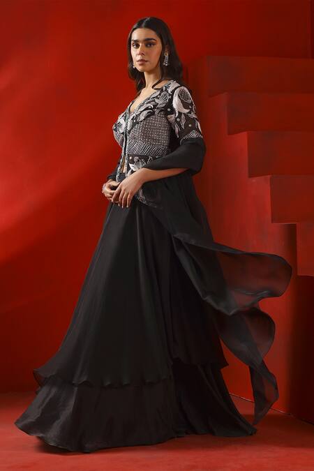 Shop ISHA GUPTA TAYAL Black Crepe Zari V-neck Layered Lehenga With Embroidered Jacket Blouse Online at Aza Fashions Shop_ISHA GUPTA TAYAL_Black Crepe Zari V-neck Layered Lehenga With Embroidered Jacket Blouse _Online_at_Aza_Fashions