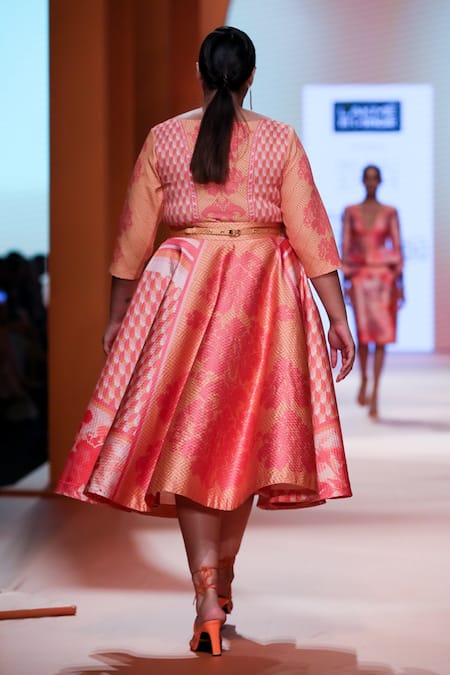 Pankaj & Nidhi_Orange Neoprene Floral And Geometric Boat Solana Bodycon Top_at_Aza_Fashions