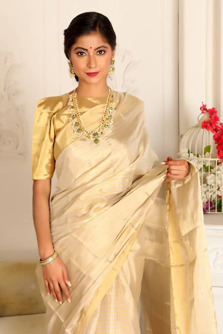 Sheela Suthar_Gold Handloom Cotton Hima Stripe Pattern Saree With Running Blouse _Online_at_Aza_Fashions
