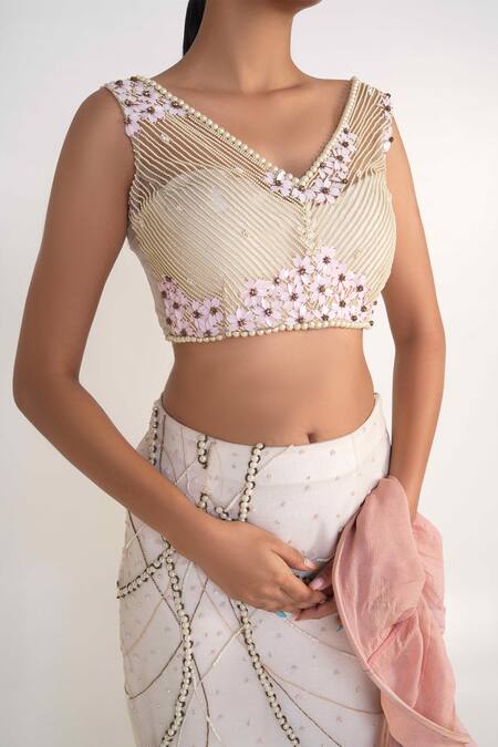 Merge Design_Ivory Net, Organza, Chiffon Pearls, Embroidery V-neck Fish Cut Lehenga Set _at_Aza_Fashions