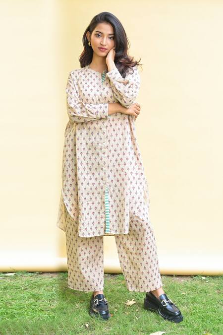 Pants And Pajamas_Beige Cotton Printed Floral Notched Kai Top_at_Aza_Fashions