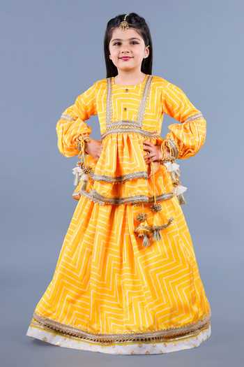 Shining Kanika_Yellow Crepe, Cotton Tassels Layered Lehenga Set _Online_at_Aza_Fashions