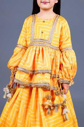 Shop_Shining Kanika_Yellow Crepe, Cotton Tassels Layered Lehenga Set _Online_at_Aza_Fashions