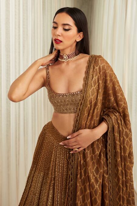 Sawan Gandhi_Gold Georgette Embellished Sequin Scoop Neck Bridal Lehenga Set_at_Aza_Fashions
