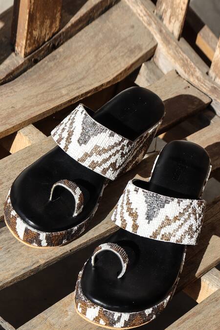 LA Fiza_White Embroidery Laraib Abstract Wedges_at_Aza_Fashions