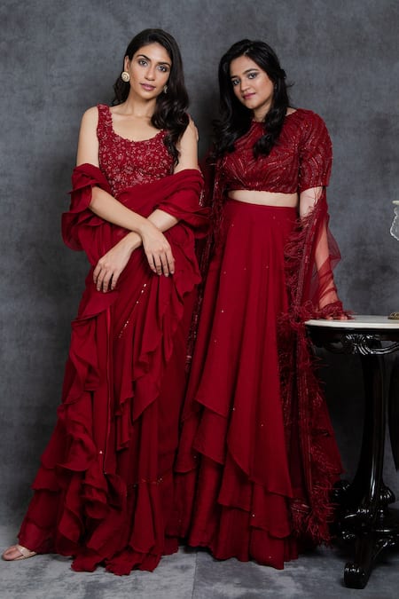 Sunita Bhandari Maroon Viscose, Georgette Cut Ruffle Pre-draped Saree With Sleeveless Blouse at Aza Fashions Sunita Bhandari_Maroon Viscose, Georgette Cut Ruffle Pre-draped Saree With Sleeveless Blouse _at_Aza_Fashions