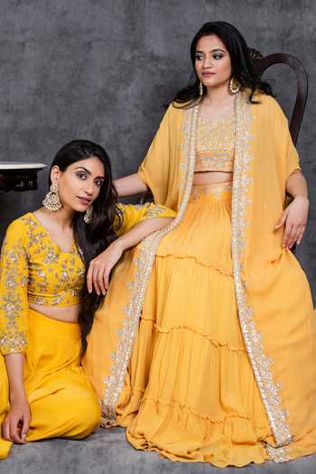 Shop_Sunita Bhandari_Yellow Viscose Gota Patti, Embroidery, Zari Placket Cape Tiered Lehenga Set _Online_at_Aza_Fashions