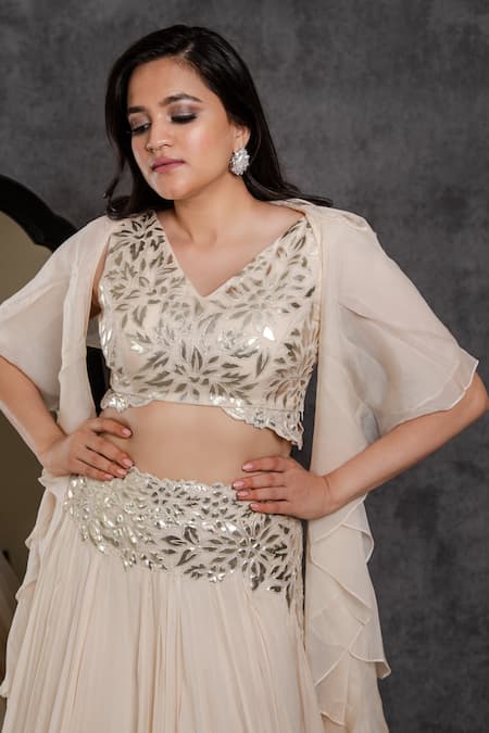 Sunita Bhandari Ivory Viscose, Organza Embroidery, Gota Patti V-neck Lehenga Set Online at Aza Fashions Sunita Bhandari_Ivory Viscose, Organza Embroidery, Gota Patti V-neck Lehenga Set _Online_at_Aza_Fashions