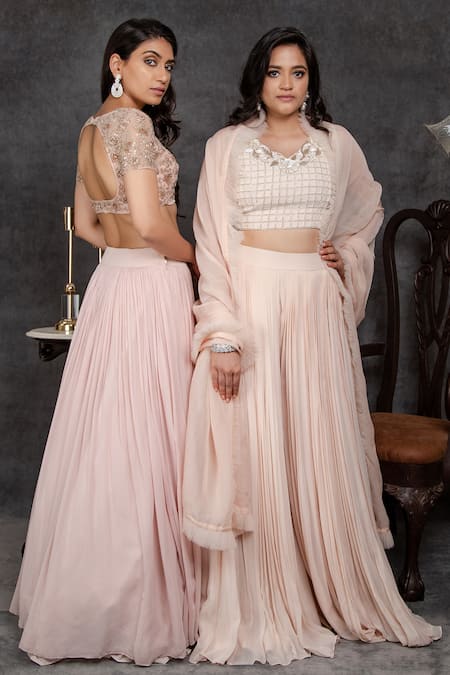 Sunita Bhandari_Pink Viscose, Georgette Sequins V-neck Pleated Sharara Blouse Set _Online_at_Aza_Fashions
