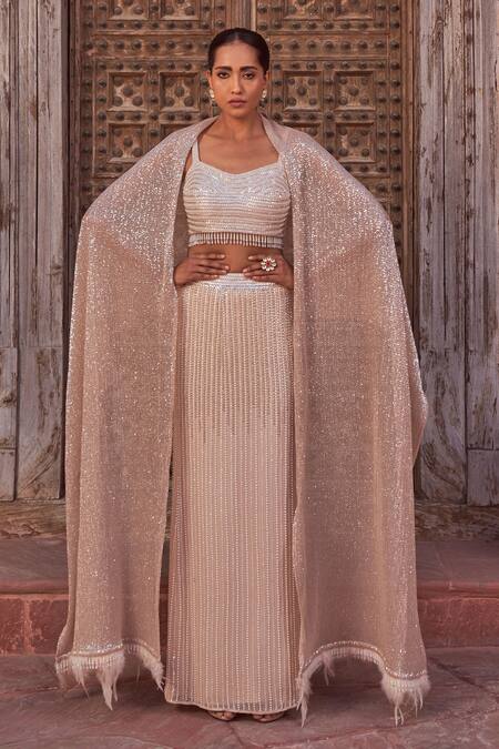 Buy_Nidhika Shekhar_Beige Silk, Georgette Sequins, Feathers, Beads, Embroidered Cape Lehenga Set _Online_at_Aza_Fashions
