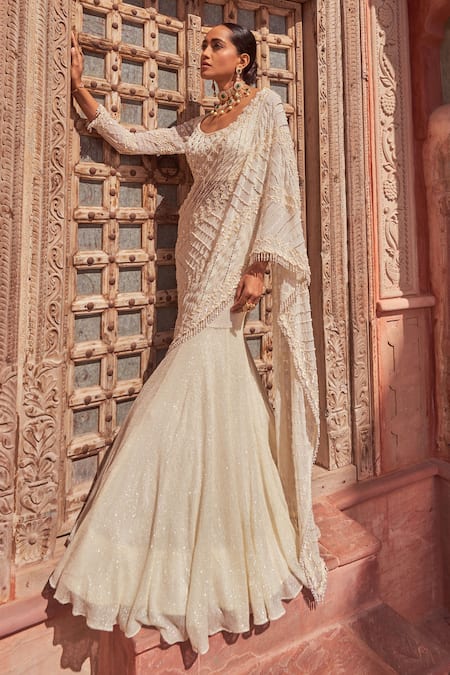 Nidhika Shekhar_Ivory Silk, Georgette, Linen Sequins, Beads Embroidered Pre-draped Lehenga Saree _Online_at_Aza_Fashions