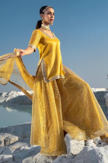 Buy Seeaash Yellow Shimmer Chanderi And Net Gota Patti, Dabka & Sequin Kurta Sharara Set Online at Aza Fashions Buy_Seeaash_Yellow Shimmer Chanderi And Net Gota Patti, Dabka & Sequin Kurta Sharara Set _Online_at_Aza_Fashions
