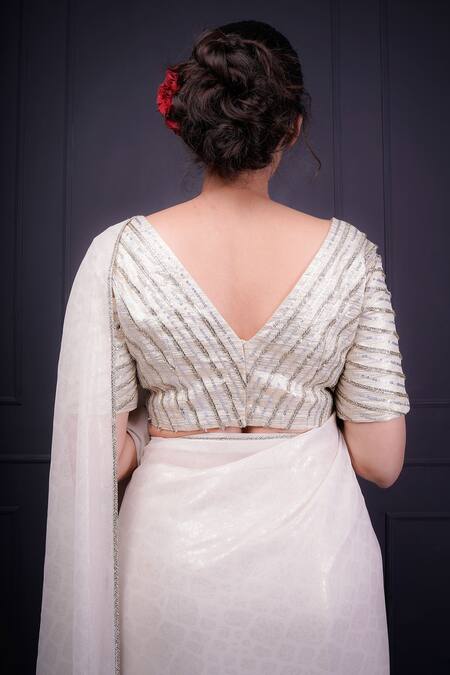 Srota By Srishti Aggarwal_White Gold Silver Foil Pattern Embroidery Sequins V Neck Saree With Blouse_at_Aza_Fashions