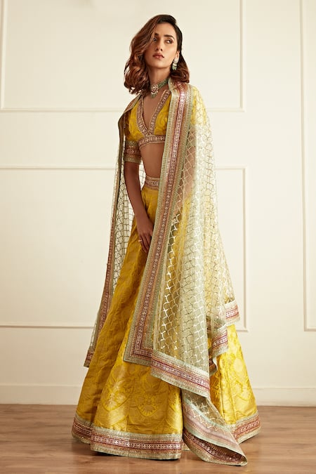Buy_Studio Iris India_Yellow Brocade, Net, Silk Sequins, Zari Plunge Embroidered Border Lehenga Set _Online_at_Aza_Fashions