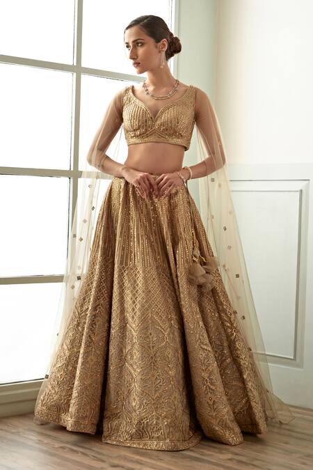 GOLD ROSETTE BLOUSE & EMBELLISHED LEHENGA – Studio East6