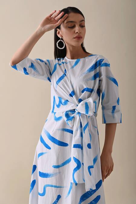 Shop_Kanelle_Ivory Cotton Round Neck Claire Stroke Print Dress_Online_at_Aza_Fashions