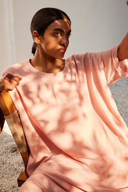 Kharakapas Pink Cotton Round Neck Baby Solid Gauge Tunic Set at Aza Fashions Kharakapas_Pink Cotton Round Neck Baby Solid Gauge Tunic Set_at_Aza_Fashions