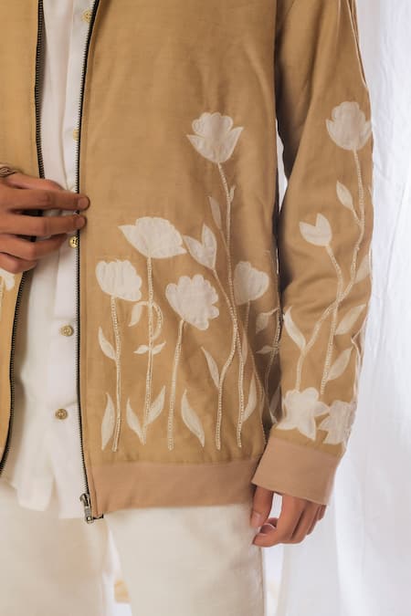 Vaani Beswal_Beige Handwoven Muga Slub Embroidery Floral Bomber Jacket _at_Aza_Fashions