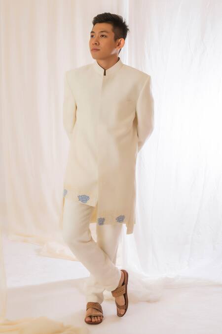 Vaani Beswal Off White Handwoven Silk Floral, Butti Asymmetric Bandhgala Online at Aza Fashions Vaani Beswal_Off White Handwoven Silk Floral, Butti Asymmetric Bandhgala _Online_at_Aza_Fashions