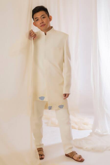 Buy Vaani Beswal Off White Handwoven Silk Floral, Butti Asymmetric Bandhgala Online at Aza Fashions Buy_Vaani Beswal_Off White Handwoven Silk Floral, Butti Asymmetric Bandhgala _Online_at_Aza_Fashions